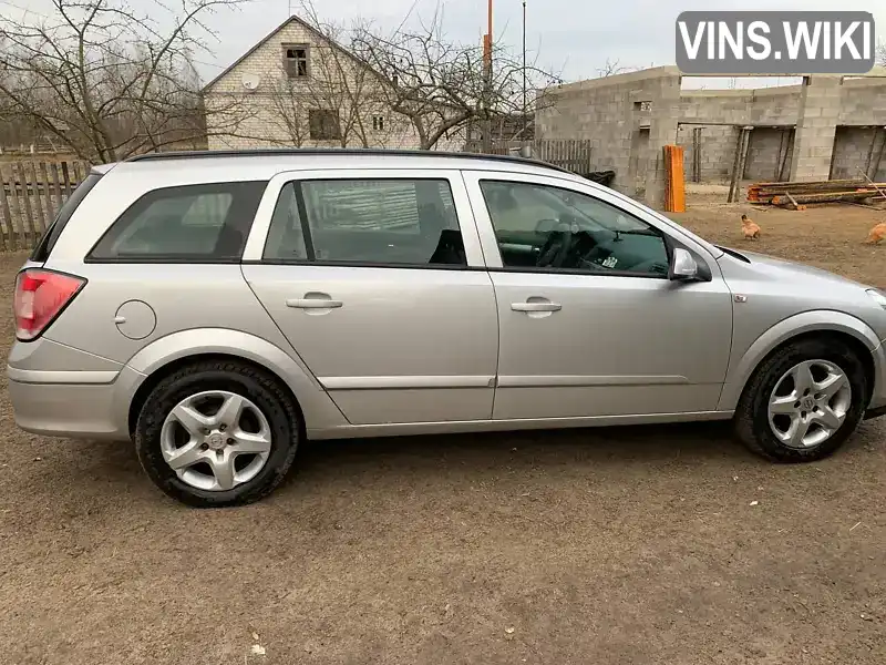 W0L0AHL3582157855 Opel Astra 2008 Универсал 1.69 л. Фото 3