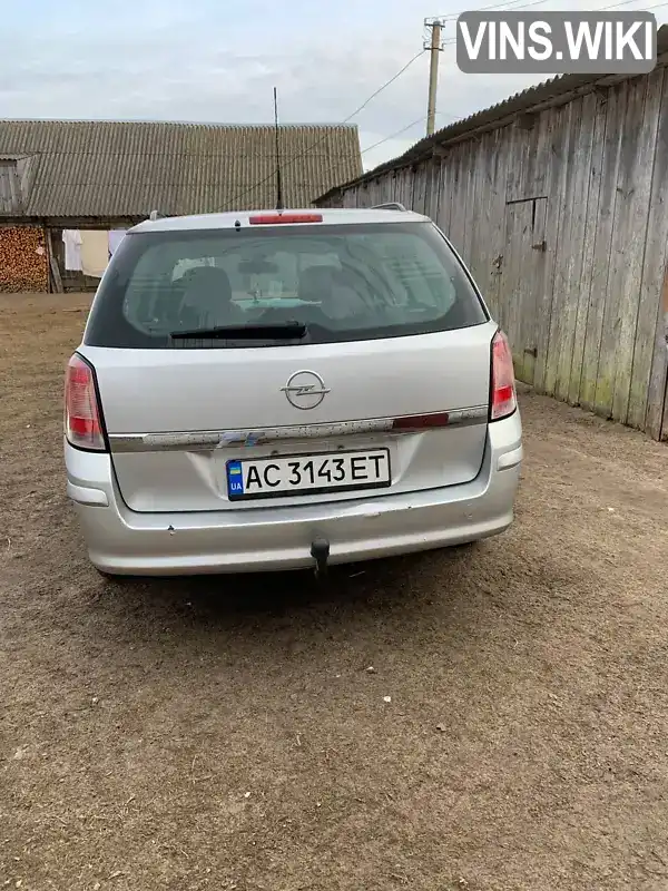 W0L0AHL3582157855 Opel Astra 2008 Универсал 1.69 л. Фото 7