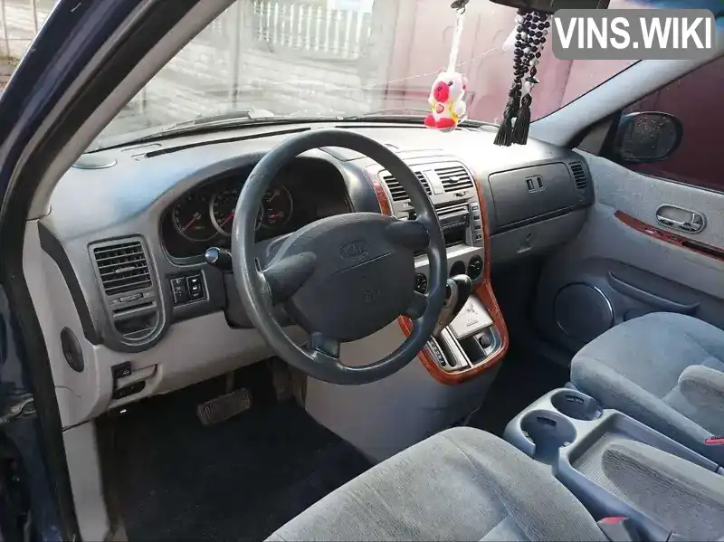 Мінівен Kia Carnival 2005 2.5 л. обл. Київська, Київ - Фото 1/21