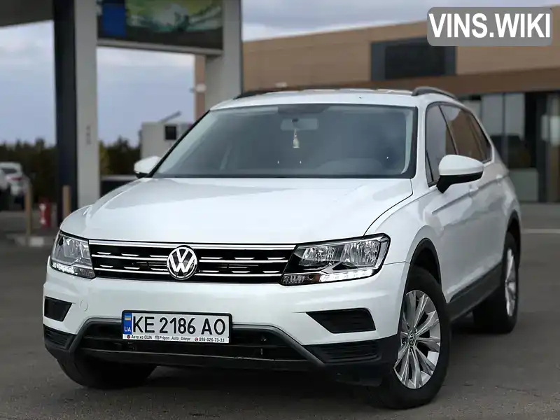 3VV1B7AX0JM107617 Volkswagen Tiguan 2018 Позашляховик / Кросовер 1.98 л. Фото 1