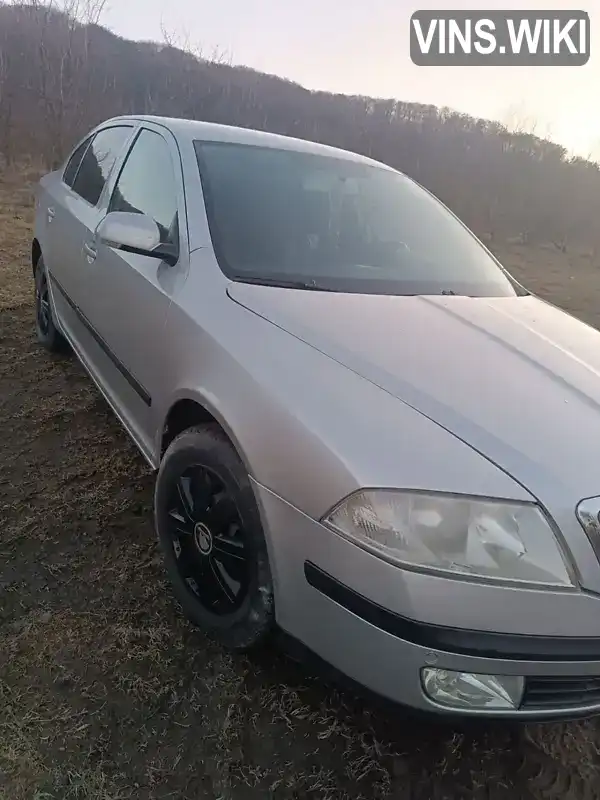 TMBCC61Z858015617 Skoda Octavia 2004 Ліфтбек 1.39 л. Фото 4