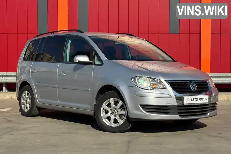 Минивэн Volkswagen Touran 2009 1.98 л. Автомат обл. Киевская, Киев - Фото 1/21