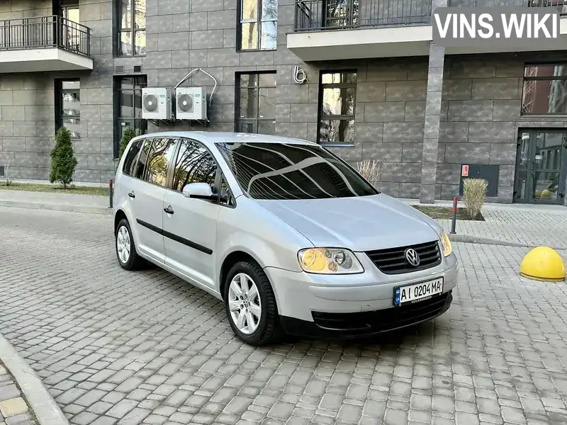 Мінівен Volkswagen Touran 2003 1.9 л. Ручна / Механіка обл. Київська, Бровари - Фото 1/21