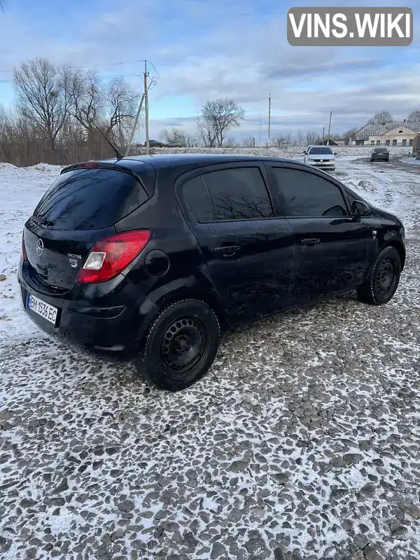 W0L0SDL68B4033570 Opel Corsa 2010 Хетчбек 1.3 л. Фото 2