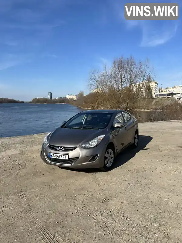 KMHDH41CADU810861 Hyundai Elantra 2013 Седан 1.6 л. Фото 2