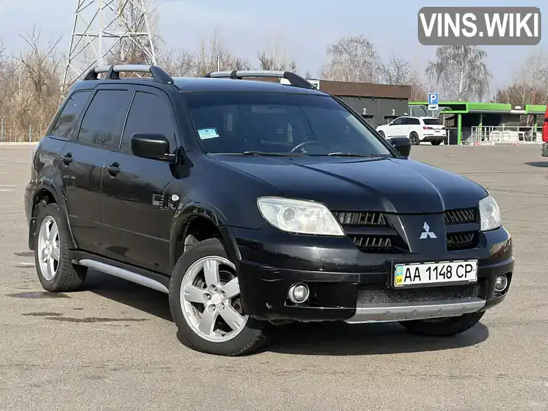 Позашляховик / Кросовер Mitsubishi Outlander 2007 2.38 л. Автомат обл. Київська, Київ - Фото 1/21