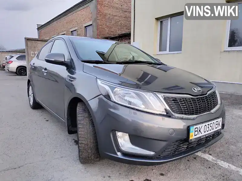 Седан Kia Rio 2013 1.59 л. Ручна / Механіка обл. Рівненська, Острог - Фото 1/13